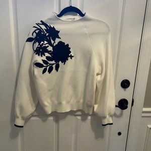 Anthropologie white sweater with black flowers size small